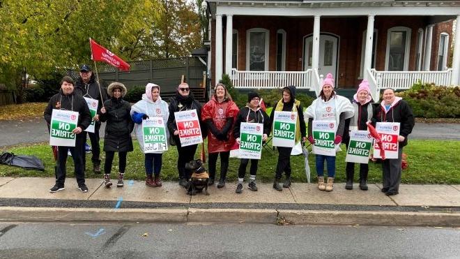 Lennox and Addington Interval House workers on the picket line in Napanee